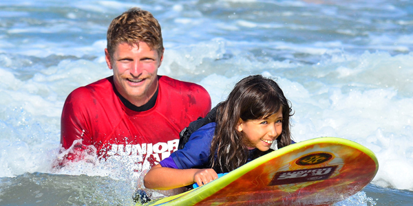 Alex and Emma Surfing.jpg